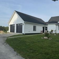 Reviving-Heritage-A-Timeless-Garage-Addition-to-a-Classic-Farm-Home 1